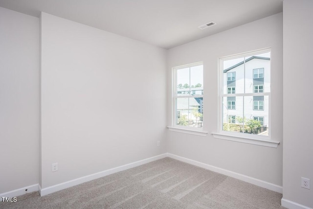 4703 Mint Leaf Ln, Raleigh, NC 27612 - carpeted spare room featuring baseboards