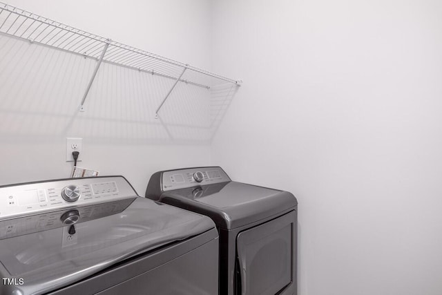 4703 Mint Leaf Ln, Raleigh, NC 27612 - laundry room with washing machine and dryer