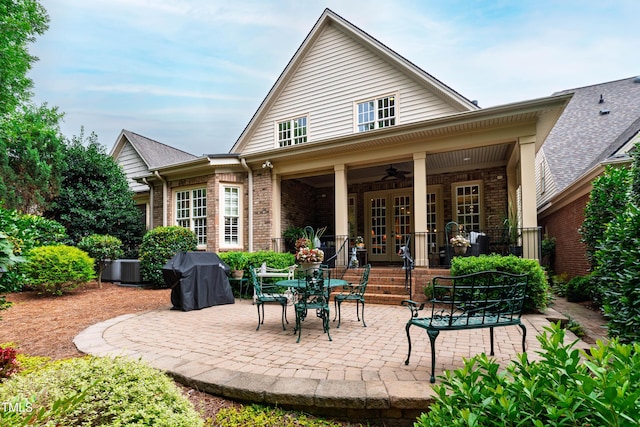 4164 English Garden Way, Raleigh, NC 27612 - rear view of property with french doors, brick siding, a ceiling fan, and a patio area