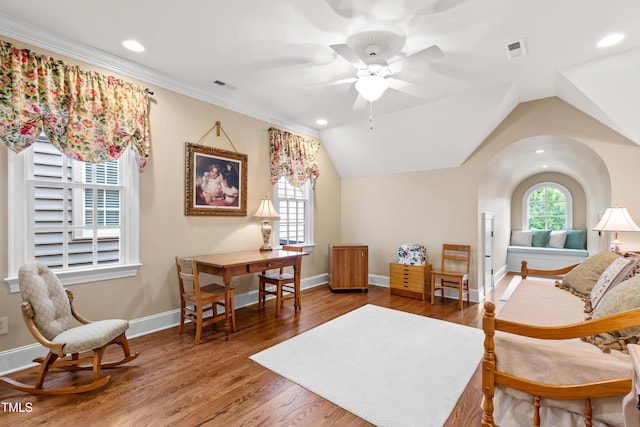 4164 English Garden Way, Raleigh, NC 27612 - living area featuring ceiling fan, wood finished floors, recessed lighting, vaulted ceiling, and arched walkways