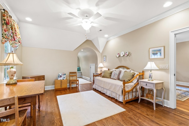 4164 English Garden Way, Raleigh, NC 27612 - bedroom with arched walkways, crown molding, wood finished floors, recessed lighting, and a ceiling fan