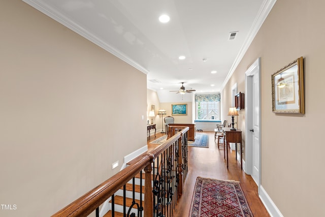 4164 English Garden Way, Raleigh, NC 27612 - hall with ornamental molding, an upstairs landing, wood finished floors, and recessed lighting