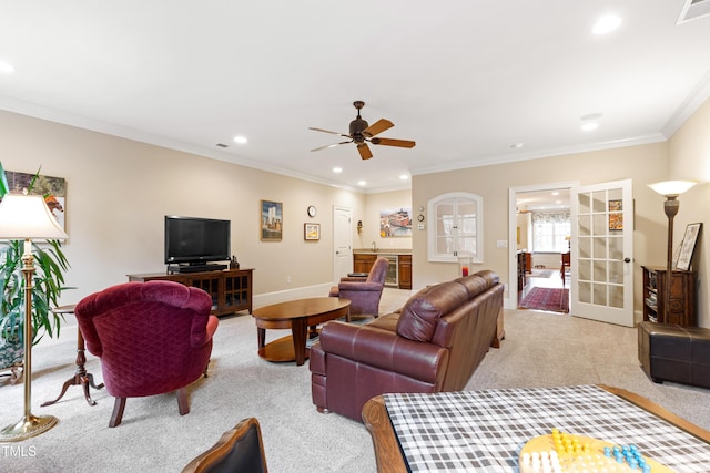 4164 English Garden Way, Raleigh, NC 27612 - living area with light colored carpet, recessed lighting, a ceiling fan, crown molding, and french doors