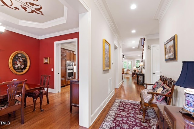 4164 English Garden Way, Raleigh, NC 27612 - hallway featuring light wood-style flooring, recessed lighting, and crown molding