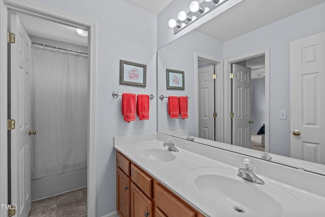 2508 Hidden Meadow Dr, Fuquay Varina, NC 27526 - bathroom featuring double vanity and shower / bathtub combination with curtain