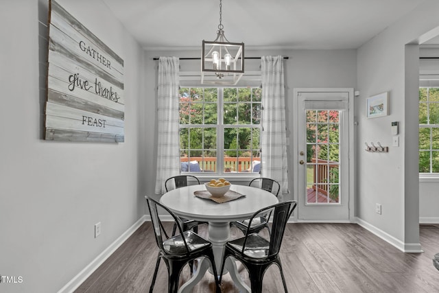 2508 Hidden Meadow Dr, Fuquay Varina, NC 27526 - dining space featuring a chandelier and wood finished floors