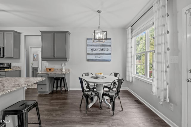2508 Hidden Meadow Dr, Fuquay Varina, NC 27526 - dining room with plenty of natural light, a chandelier, and dark wood finished floors