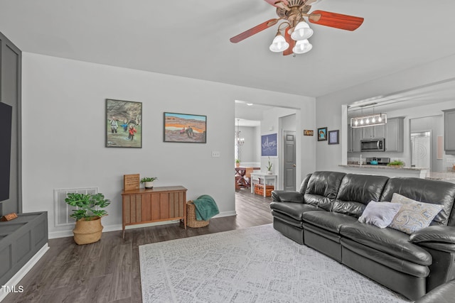2508 Hidden Meadow Dr, Fuquay Varina, NC 27526 - living area with dark wood-type flooring and a ceiling fan