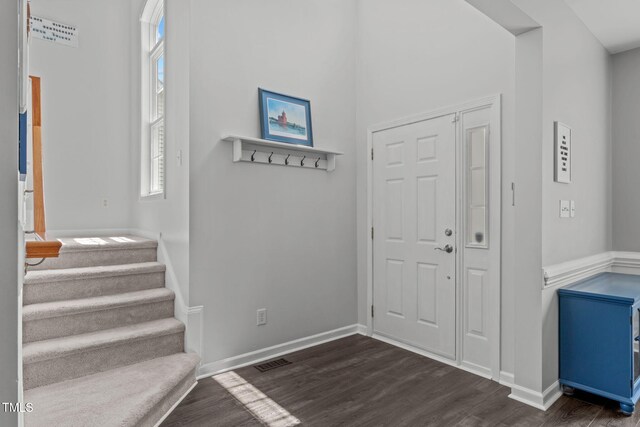 2508 Hidden Meadow Dr, Fuquay Varina, NC 27526 - entrance foyer with dark wood-style flooring and stairs