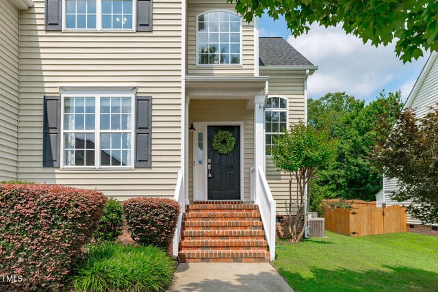 2508 Hidden Meadow Dr, Fuquay Varina, NC 27526 - view of exterior entry featuring a shingled roof