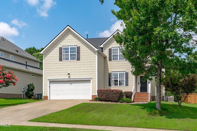 2508 Hidden Meadow Dr, Fuquay Varina, NC 27526 - traditional-style house with an attached garage, a front yard, and driveway
