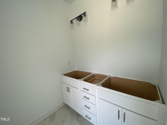 202 Rae Dr, Pikeville, NC 27863 - bathroom featuring marble look tiles and baseboards
