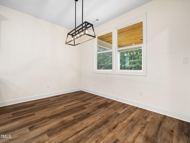 10 Hermitage, Franklinton, NC 27525 - unfurnished dining area with a chandelier and dark wood-type flooring