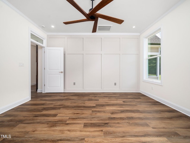 10 Hermitage, Franklinton, NC 27525 - unfurnished bedroom with crown molding, dark wood-style floors, a decorative wall, recessed lighting, and a ceiling fan