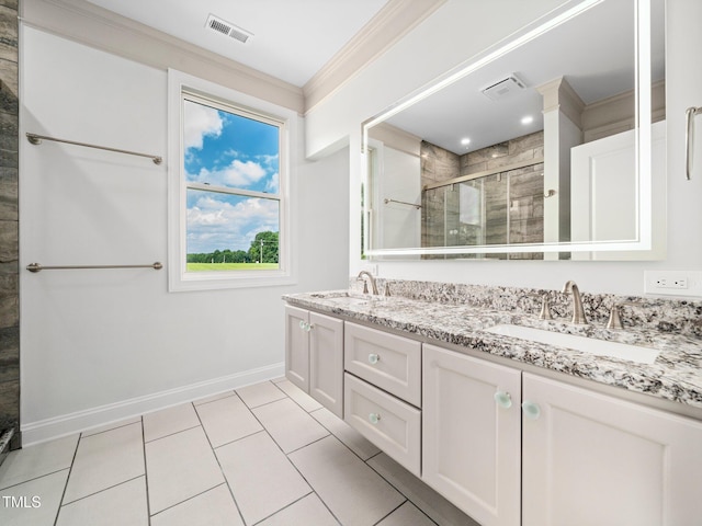 10 Hermitage, Franklinton, NC 27525 - full bathroom featuring a shower stall, double vanity, crown molding, and tile patterned flooring
