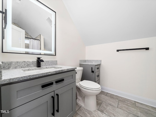 10 Hermitage, Franklinton, NC 27525 - bathroom featuring vaulted ceiling, vanity, and curtained shower