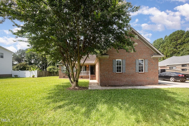 104 Fairfield Dr, Goldsboro, NC 27530 - back of property with brick siding and a porch