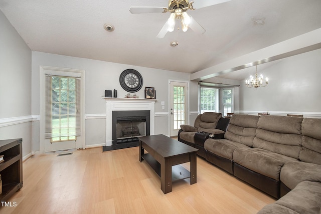 104 Fairfield Dr, Goldsboro, NC 27530 - living room with light wood-type flooring, a fireplace, a ceiling fan, healthy amount of natural light, and lofted ceiling