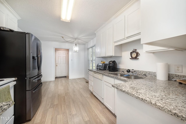 104 Fairfield Dr, Goldsboro, NC 27530 - kitchen with white dishwasher, white cabinetry, stainless steel fridge with ice dispenser, light wood-type flooring, and a textured ceiling