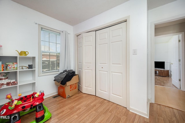 104 Fairfield Dr, Goldsboro, NC 27530 - playroom with light wood-style flooring and baseboards