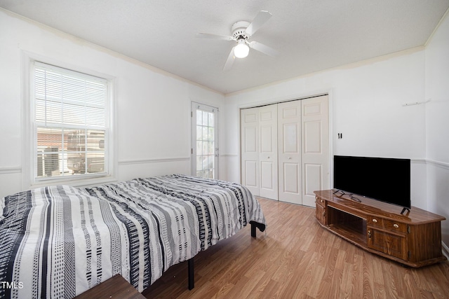 104 Fairfield Dr, Goldsboro, NC 27530 - bedroom with multiple windows, wood finished floors, a closet, and a ceiling fan