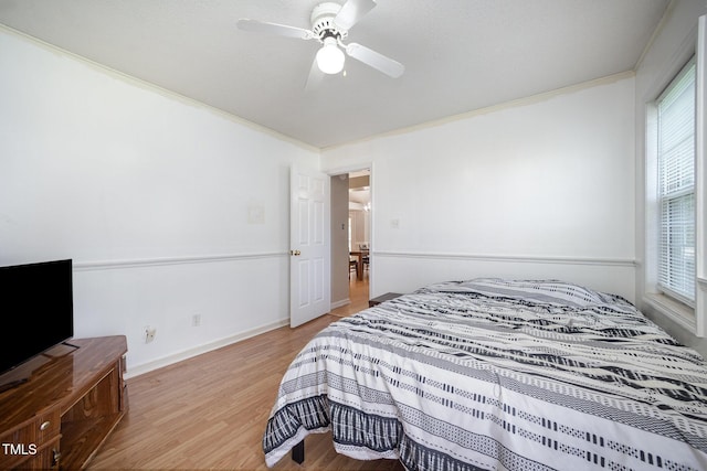 104 Fairfield Dr, Goldsboro, NC 27530 - bedroom featuring light wood-type flooring, ornamental molding, and a ceiling fan