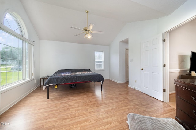 104 Fairfield Dr, Goldsboro, NC 27530 - bedroom with vaulted ceiling, multiple windows, light wood finished floors, and a ceiling fan