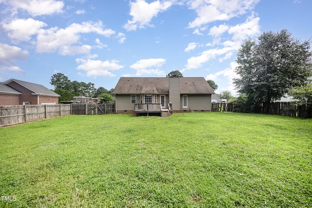 104 Fairfield Dr, Goldsboro, NC 27530 - back of house featuring crawl space, a fenced backyard, and a wooden deck