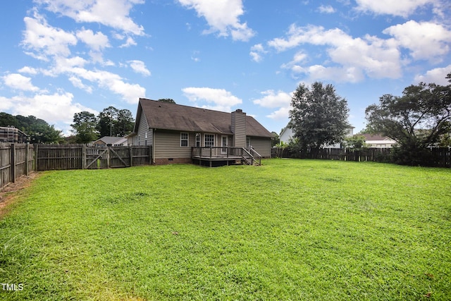 104 Fairfield Dr, Goldsboro, NC 27530 - fenced backyard with a deck