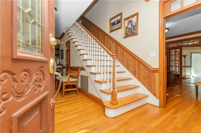 387 Three Bridge Rd, Dunn, NC 28334 - stairway with wood finished floors and wainscoting