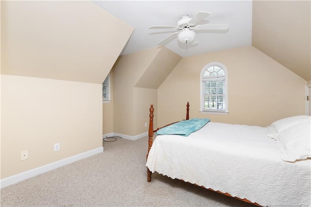 387 Three Bridge Rd, Dunn, NC 28334 - carpeted bedroom with vaulted ceiling and a ceiling fan
