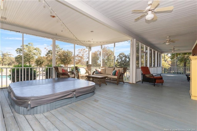 387 Three Bridge Rd, Dunn, NC 28334 - sunroom featuring a ceiling fan, a jacuzzi, and an outdoor living space