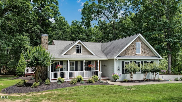 150 Bud Rd, Reidsville, NC 27320 - view of front facade with covered porch, a front yard, a chimney, and roof with shingles