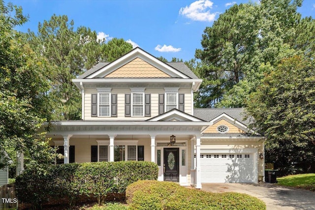 109 Gullane Ct, Apex, NC 27502 - victorian-style house with concrete driveway, a garage, and covered porch