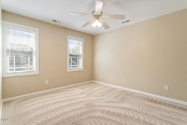 109 Gullane Ct, Apex, NC 27502 - carpeted spare room with baseboards and a ceiling fan