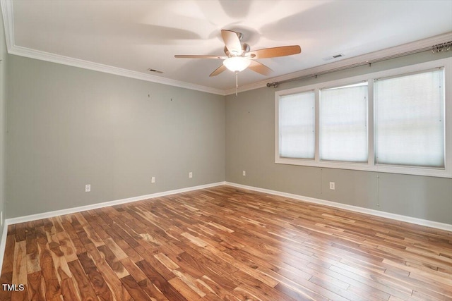 109 Gullane Ct, Apex, NC 27502 - unfurnished room featuring wood finished floors, ceiling fan, and crown molding