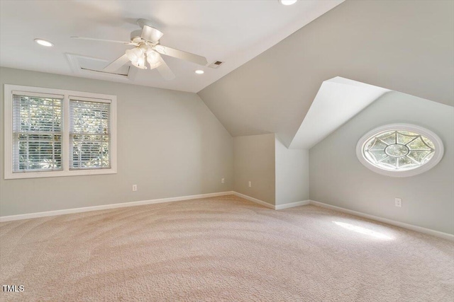109 Gullane Ct, Apex, NC 27502 - additional living space with light carpet, vaulted ceiling, a ceiling fan, and recessed lighting