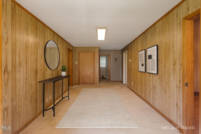 3702 Danube Ln, Durham, NC 27704 - corridor with wooden walls and light colored carpet