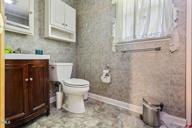 3702 Danube Ln, Durham, NC 27704 - bathroom featuring tile walls and vanity