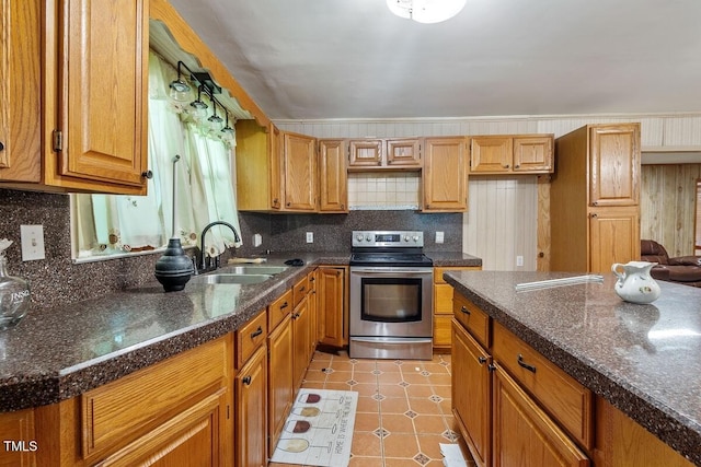 3702 Danube Ln, Durham, NC 27704 - kitchen with electric range, tasteful backsplash, and dark countertops