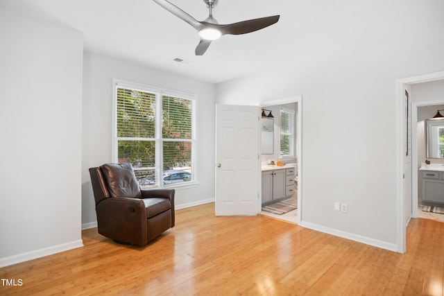 105 Fountain Ridge Pl, Holly Springs, NC 27540 - living area with light wood-type flooring and ceiling fan