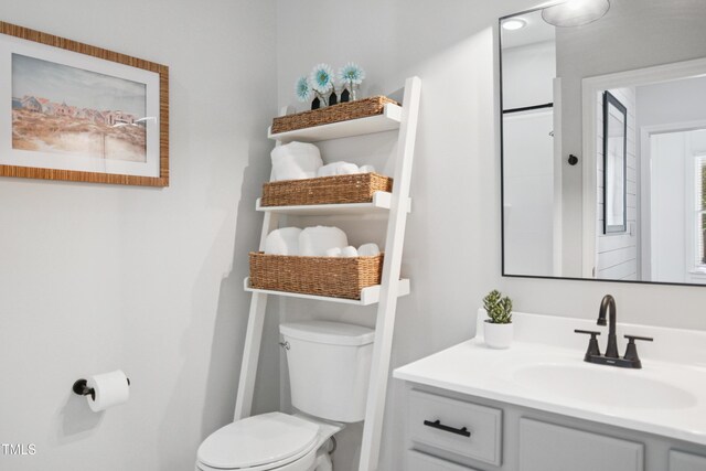 105 Fountain Ridge Pl, Holly Springs, NC 27540 - bathroom featuring toilet and vanity