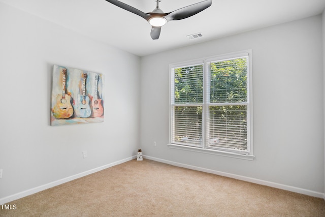 105 Fountain Ridge Pl, Holly Springs, NC 27540 - carpeted spare room featuring baseboards and ceiling fan