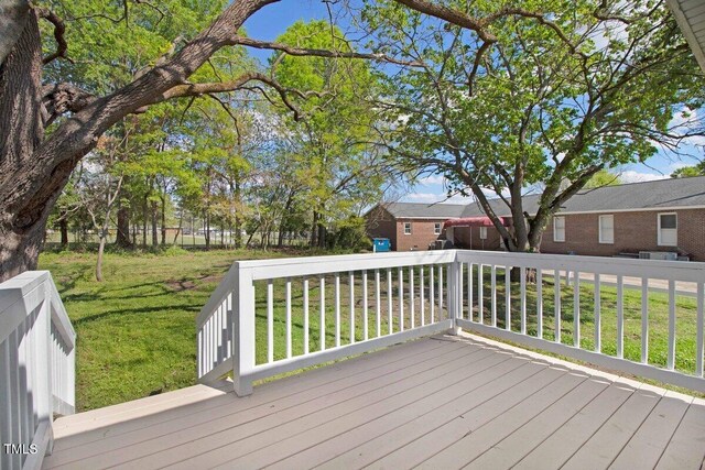 400 E Townsend St, Dunn, NC 28334 - wooden terrace featuring a yard