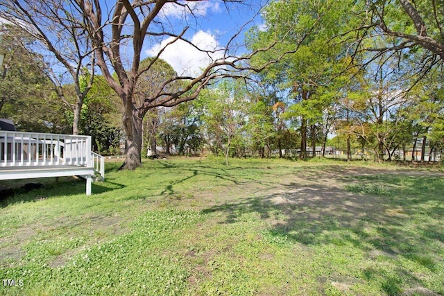 400 E Townsend St, Dunn, NC 28334 - view of grassy yard featuring a wooden deck