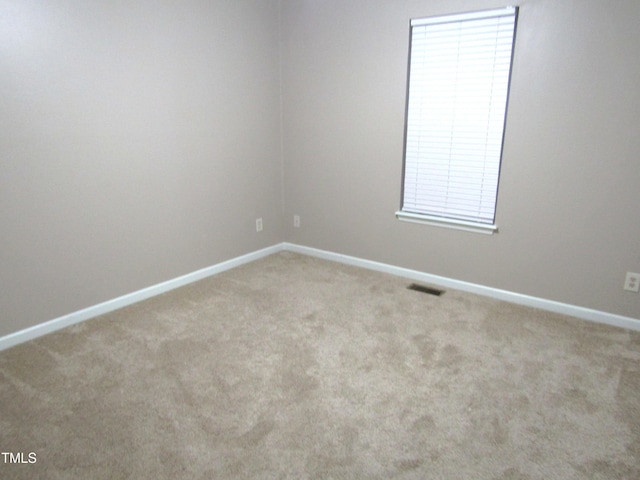 409 James Toney Dr, Elon, NC 27244 - carpeted spare room with baseboards