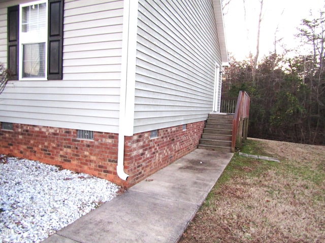 409 James Toney Dr, Elon, NC 27244 - view of side of property with crawl space