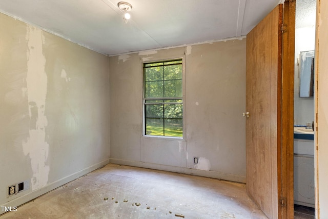 3170 Loblolly Ln, Wake Forest, NC 27587 - empty room with unfinished concrete floors