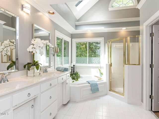 5032 Salem Ridge Rd, Holly Springs, NC 27540 - full bathroom featuring a stall shower, a bath, healthy amount of natural light, a skylight, and vaulted ceiling