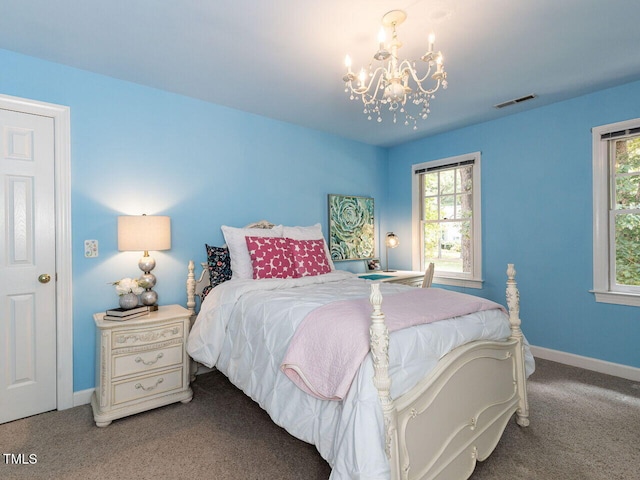 5032 Salem Ridge Rd, Holly Springs, NC 27540 - carpeted bedroom with a chandelier and multiple windows